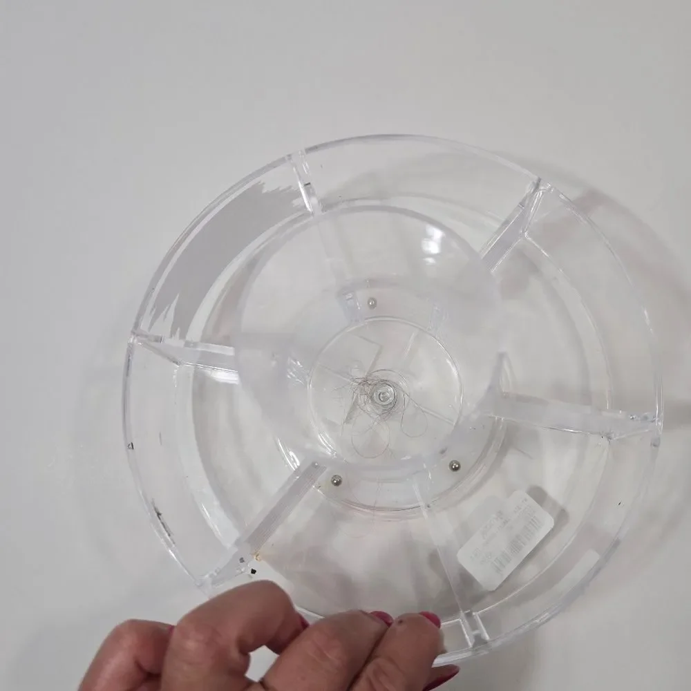 Circle, moveable makeup holder